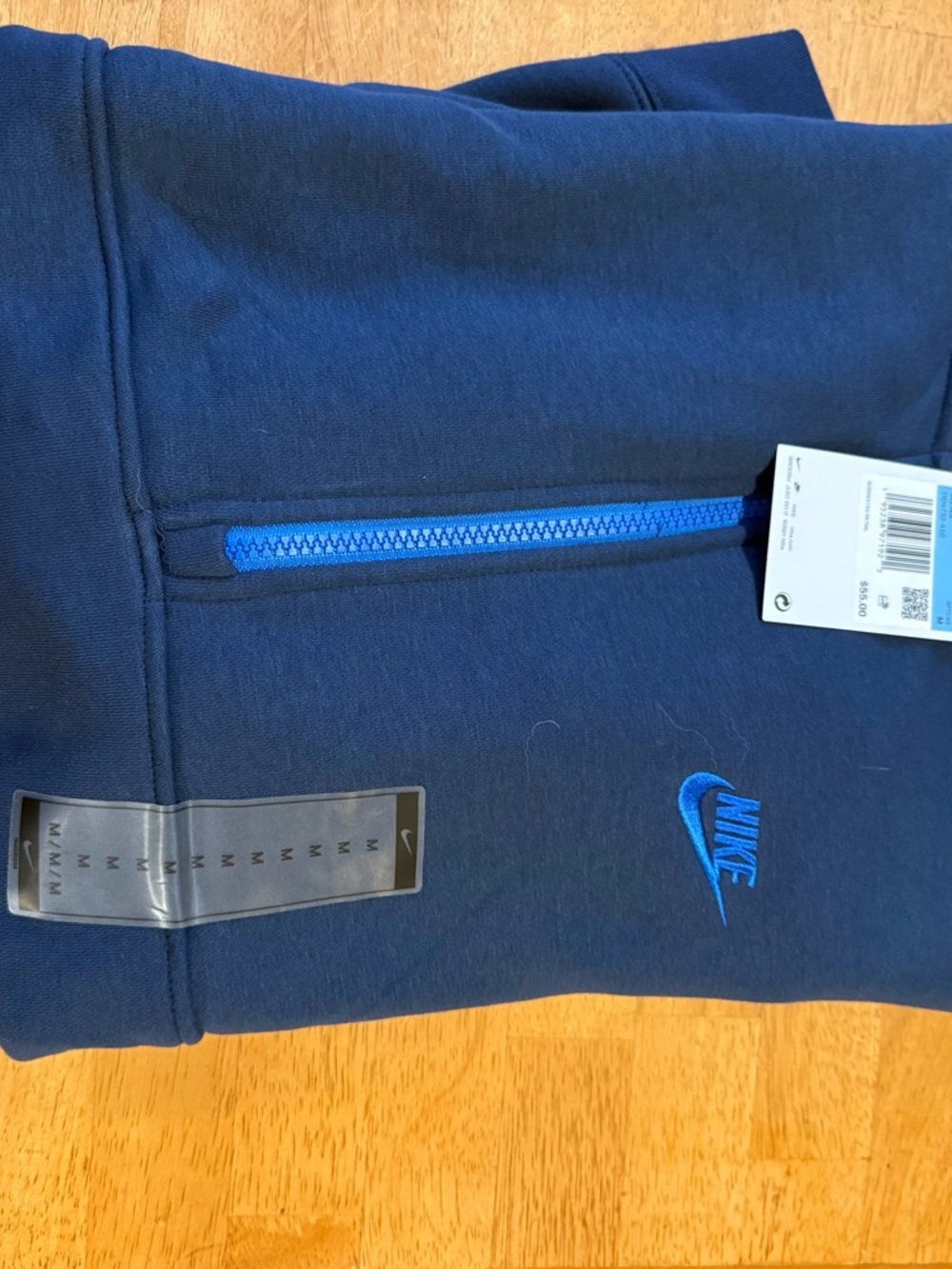 Nike Navy Hoodie with Bright Blue Zip Detail